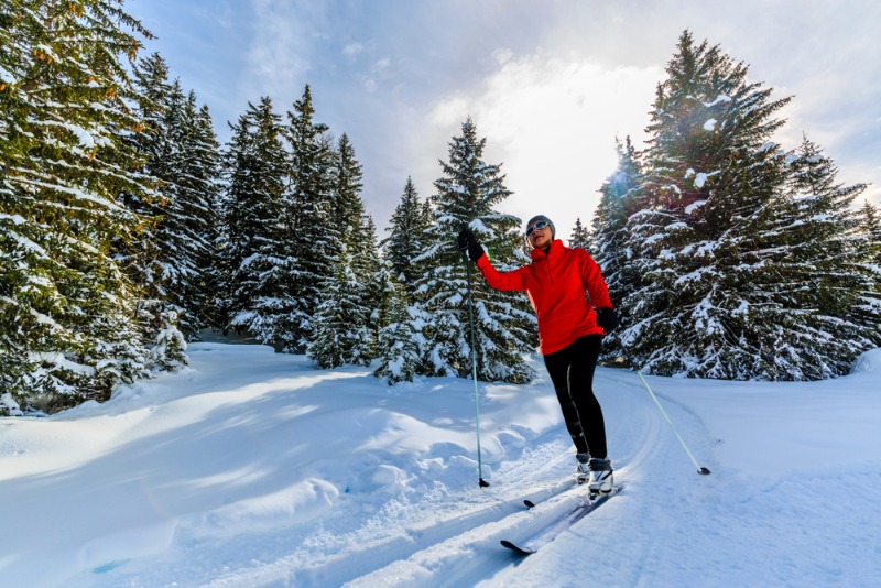Cross-Country Skiing Colorado: A woman cross-country skiing amid the backcountry near Estes Park, Colorado.